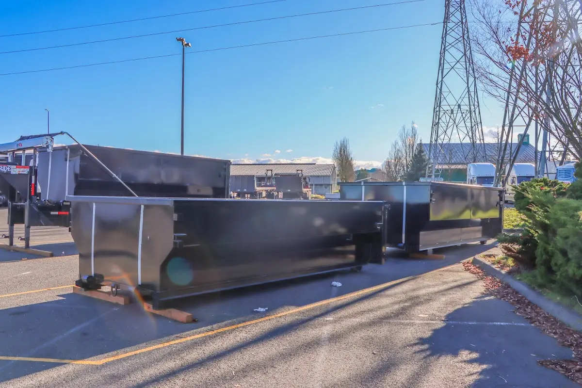 Roll-off dumpster ready for waste disposal at job site for Roofing Dumpster Rental in Milton